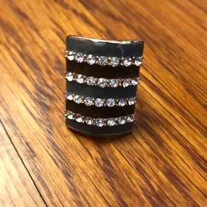 Gray and brown golden ring with diamonds